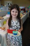 Cody_Trengove_was_happy_with_her_second_placed_Decorated_Cup_Cakes_in_the_Girl_Guides_Competition.jpg